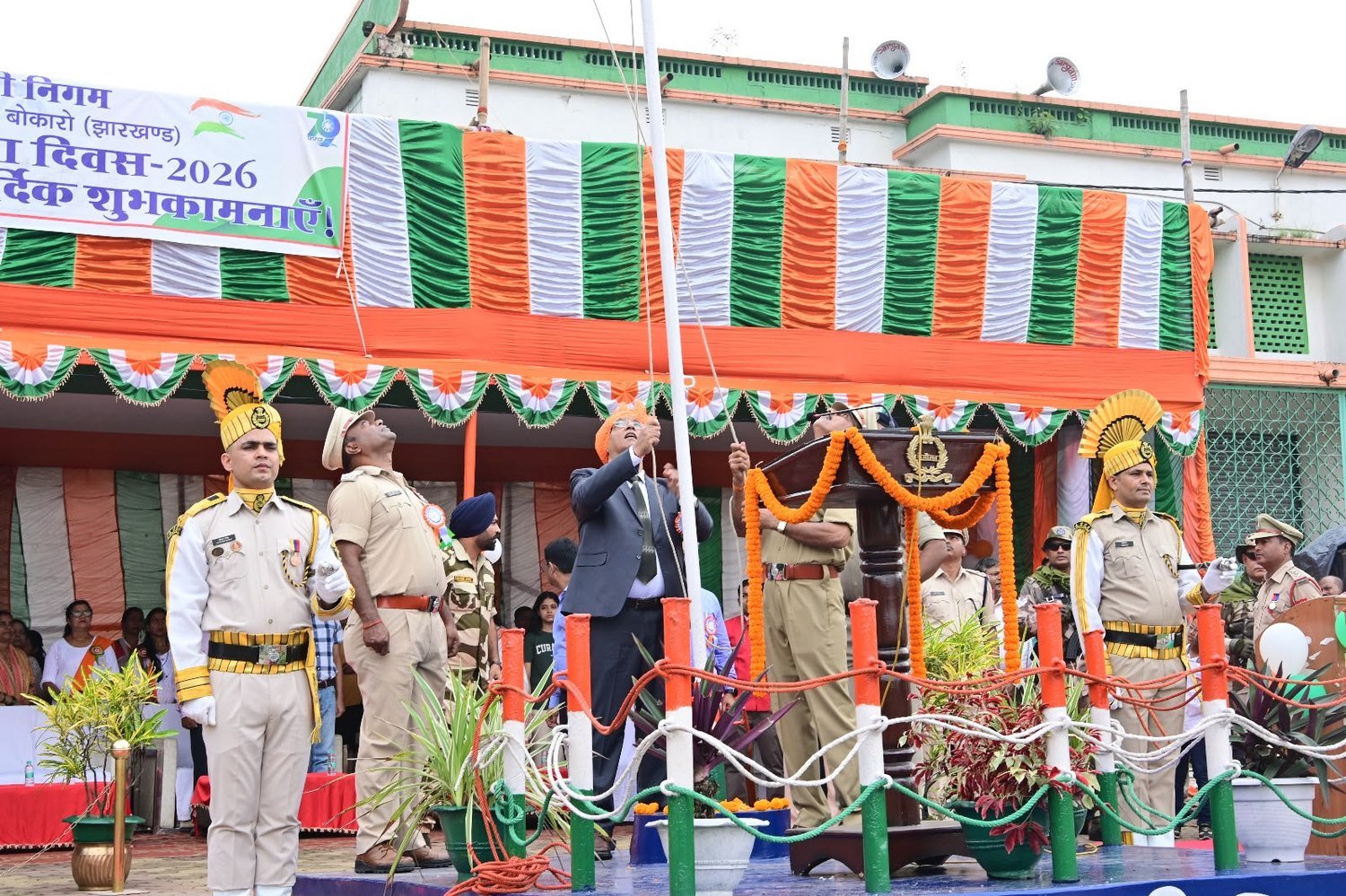 The national flag is hoisted at a DVC station during Independence Day celebrations